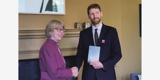 Tim Gee meeting Sarah Mulally.